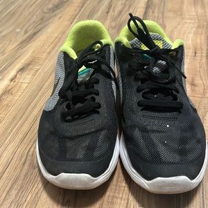 Black grey and green Nikes
